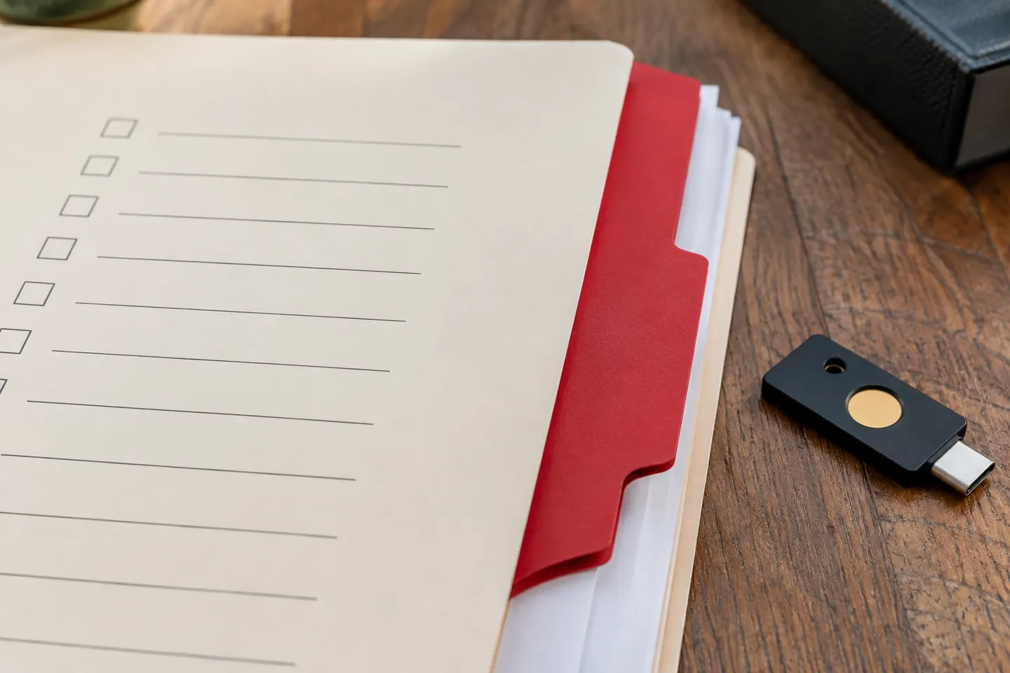 A status folder beside a security key
